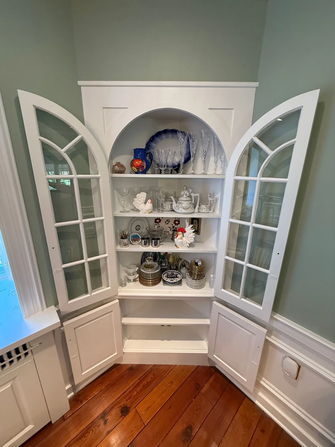 Built-in cabinet painting by Premier Painting Solutions
